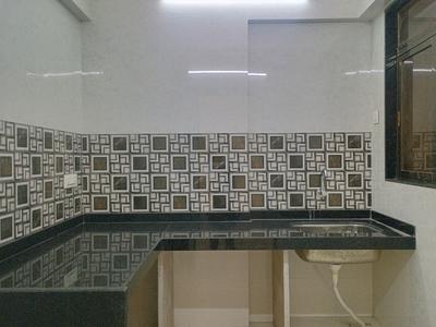 Kitchen Image of 1110 Sq.ft 3 BHK Apartment / Flat for sale in Shreeji Krishna Nayan Complex Phase I, Badlapur East Badlapur for Rs. 5150000