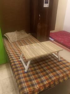 Bedroom Image of Sri Balaji PG in Jhilmil Colony, New Delhi
