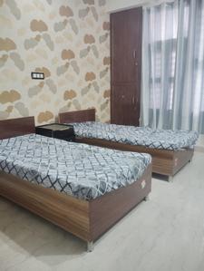 Bedroom Image of Mustang Coliving PG in DLF Phase 5, Gurgaon