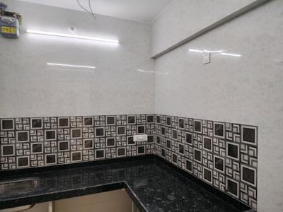 Kitchen Image of 550 Sq.ft 1 BHK Apartment / Flat for rent in Unnati Woods Phase 7, Kasarvadavali Thane for Rs. 17999