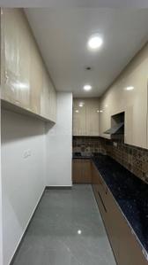 Kitchen Image of 900 Sq.ft 3 BHK Builder Floor for rent in Chhattarpur New Delhi for Rs. 32000