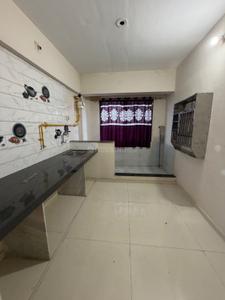 Kitchen Image of 850 Sq.ft 1 BHK Apartment / Flat for sale in Pramukh Yogi Milan, Yogi Vihar Silvassa for Rs. 2800000