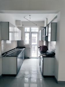 Kitchen Image of 1324 Sq.ft 3 BHK Apartment / Flat for rent in Amrapali Zodiac, Sector 120 Noida for Rs. 26000