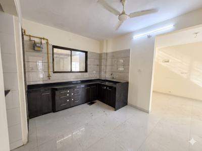 Kitchen Image of 1215 Sq.ft 2 BHK Apartment / Flat for rent in Rajhans Platinum Residency, Palanpur Surat for Rs. 16000
