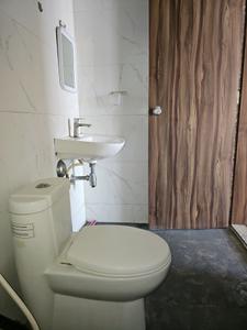 Common Bathroom Image of 650 Sq.ft 1 BHK Apartment / Flat for rent in Umiya Dreams Icon, Wagholi Pune for Rs. 15000