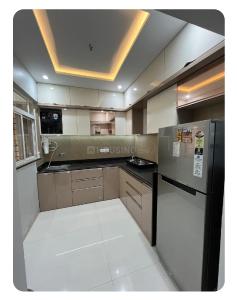 Kitchen Image of 1000 Sq.ft 2 BHK Apartment / Flat for rent in Vertical Alcinia, Mohammed Wadi Pune for Rs. 35000