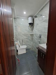 Bathroom Image of 450 Sq.ft 1 RK Builder Floor for rent in Aez Aloha, Sector 57 Gurgaon for Rs. 24000