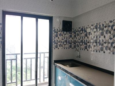 Kitchen Image of 650 Sq.ft 1 BHK Apartment / Flat for sale in Cosmos Empress Park, Kasarvadavali Thane for Rs. 7000000