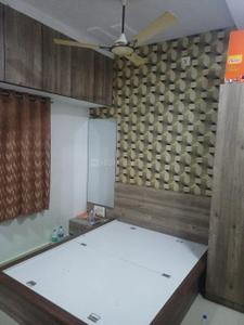 Bedroom Image of 1300 Sq.ft 2 BHK Duplex for rent in Navnirman Shubhlaxmi Residency, Dindoli Surat for Rs. 20000