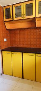 Kitchen Image of 690 Sq.ft 1 BHK Apartment / Flat for sale in Abrol Krishna Green Land Park Phase II, Kasarvadavali Thane for Rs. 5750000
