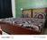 Bedroom Image of Sumit Coliving PG in Sector 52, Noida