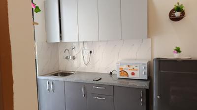 Kitchen Image of 700 Sq.ft 1 RK Independent House for rent in Sector 57 Gurgaon for Rs. 26000