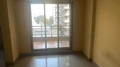 Living Room Image of 770 Sq.ft 1 BHK Apartment / Flat for rent in Mohan Willows II, Badlapur East Badlapur for Rs. 8500