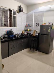 Kitchen Image of 915 Sq.ft 2 BHK Apartment / Flat for sale in Warje Pune for Rs. 8800000
