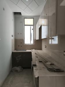 Kitchen Image of 1500 Sq.ft 3 BHK Apartment / Flat for sale in Ambesten Twin Chalet, Noida Extension Greater Noida for Rs. 5900450