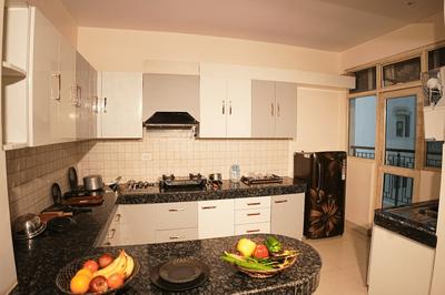 Kitchen Image of 1750 Sq.ft 3 BHK Apartment / Flat for rent in Paarth Aadyant, Ahmamau Lucknow for Rs. 45000