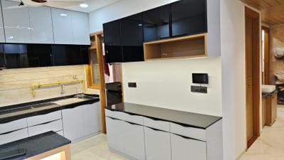 Kitchen Image of 2376 Sq.ft 3 BHK Apartment / Flat for sale in Radhe Infinity, Kudasan Gandhinagar for Rs. 14000000