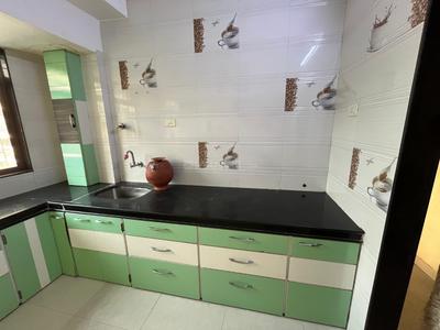 Kitchen Image of 692 Sq.ft 1 BHK Apartment / Flat for rent in Om Shivam Residency, Kamothe Navi Mumbai for Rs. 21000