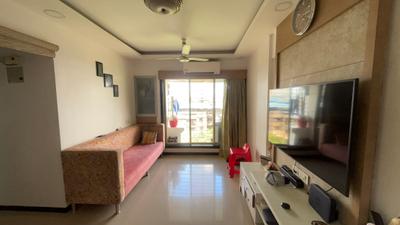 Living Room Image of 830 Sq.ft 2 BHK Apartment / Flat for sale in PNK Poonam Sagar Complex, Mira Road East Mira Bhayandar for Rs. 12200000