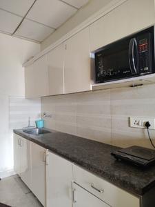 Kitchen Image of 435 Sq.ft 1 RK Apartment / Flat for rent in Paramount Pine And Oak Studio, Surajpur Greater Noida for Rs. 15000