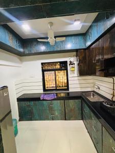 Kitchen Image of 1150 Sq.ft 2 BHK Independent House for rent in Kopar Khairane Navi Mumbai for Rs. 45000