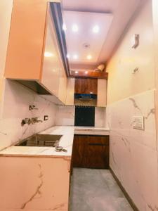 Kitchen Image of 540 Sq.ft 2 BHK Apartment / Flat for rent in Dream Home Luxury Floors, Dwarka Mor New Delhi for Rs. 12000