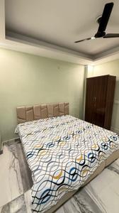 Bedroom Image of 950 Sq.ft 2 BHK Builder Floor for rent in Khirki Extension New Delhi for Rs. 32000