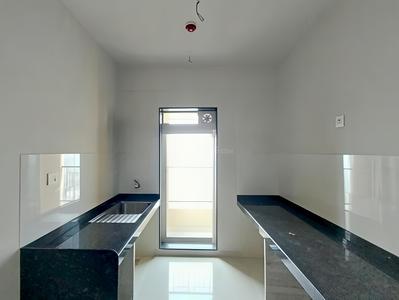 Kitchen Image of 1020 Sq.ft 2 BHK Apartment / Flat for rent in Rustomjee Azziano, Thane West Thane for Rs. 45000