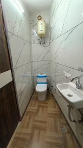 Bathroom Image of 450 Sq.ft 1 RK Builder Floor for rent in Rajouri Garden New Delhi for Rs. 22000