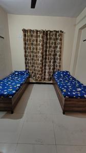 Bedroom Image of Feel Home PG Services  in Kopar Khairane, Navi Mumbai