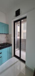 Kitchen Image of 1032 Sq.ft 2 BHK Apartment / Flat for rent in Shapoorji Pallonji Joyville Sensorium, Maan Pune for Rs. 26000