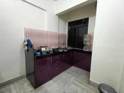Kitchen Image of 650 Sq.ft 1 BHK Apartment / Flat for rent in Kopar Khairane Navi Mumbai for Rs. 35000
