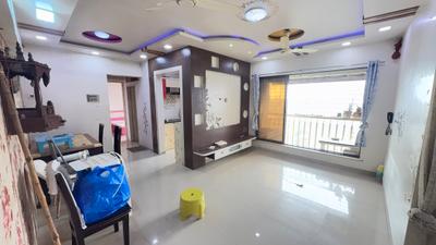 Living Room Image of 1060 Sq.ft 2 BHK Apartment / Flat for sale in Unique Aurum, Mira Road East Mira Bhayandar for Rs. 12000000