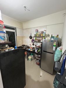 Kitchen Image of 960 Sq.ft 2 BHK Apartment / Flat for rent in Dheeraj Jade Residences , Wagholi Pune for Rs. 24000