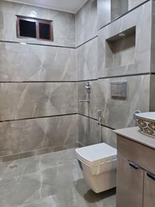 Common Bathroom Image of 1300 Sq.ft 4 BHK Apartment / Flat for sale in Uttam Nagar New Delhi for Rs. 13500000