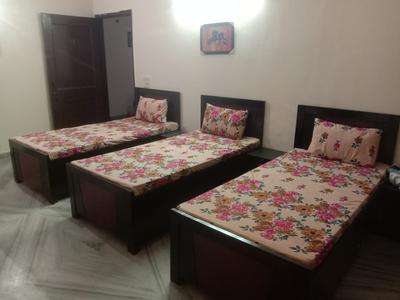 Bedroom Image of Chitra boys pg in Sector 41, Noida