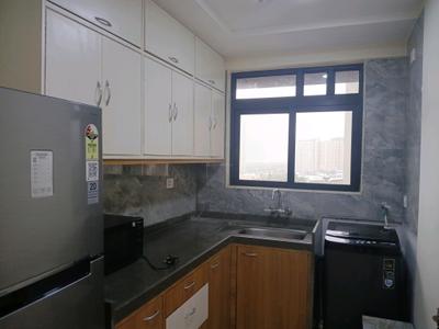 Kitchen Image of 810 Sq.ft 1 BHK Apartment / Flat for rent in Earth Anand, Mandvi Mumbai for Rs. 55000