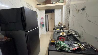 Kitchen Image of 935 Sq.ft 2 BHK Apartment / Flat for rent in Mohan Highlands, Badlapur East Badlapur for Rs. 14000