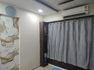 Bedroom Image of 545 Sq.ft 2 BHK Apartment / Flat for rent in Raunak Unnathi Woods, Kasarvadavali Thane for Rs. 24999