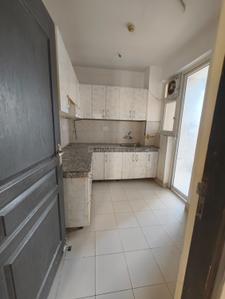 Kitchen Image of 1100 Sq.ft 2 BHK Apartment / Flat for rent in The 3C Lotus Zing, Sector 168 Noida for Rs. 24500