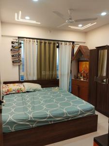 Bedroom Image of 1350 Sq.ft 3 BHK Apartment / Flat for sale in Krisna Nirmaan Amorapolis, Dhanori Pune for Rs. 9900000