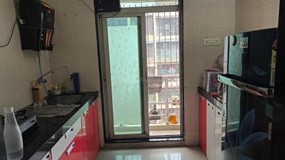 Kitchen Image of 695 Sq.ft 1 BHK Apartment / Flat for rent in Gajra Bhoomi Gardenia, Kalamboli Navi Mumbai for Rs. 20000