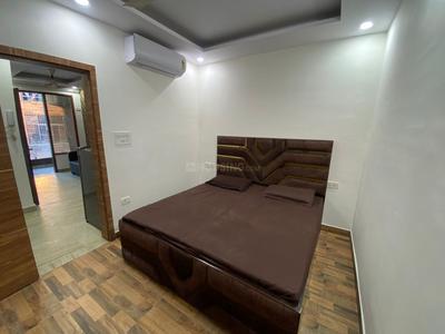 Bedroom Image of 450 Sq.ft 1 BHK Builder Floor for rent in Ramesh Nagar New Delhi for Rs. 26000
