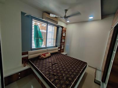 Bedroom Image of 666 Sq.ft 1 BHK Apartment / Flat for rent in Kalp Capitol Flora And Capitol Icon, Sargasan Gandhinagar for Rs. 20500