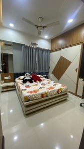 Bedroom Image of 765 Sq.ft 3 BHK Apartment / Flat for sale in Himalaya and Mainland Pinnacle Block A To D, Tragad Ahmedabad for Rs. 9000000