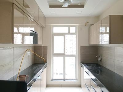 Kitchen Image of 1100 Sq.ft 3 BHK Apartment / Flat for rent in Godrej Emerald, Kasarvadavali Thane for Rs. 38000