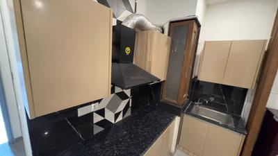 Kitchen Image of 990 Sq.ft 1 BHK Builder Floor for rent in DLF Phase 3 Gurgaon for Rs. 34900