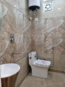Common Bathroom Image of 600 Sq.ft 2 BHK Apartment / Flat for sale in Dwarka Mor New Delhi for Rs. 4600000