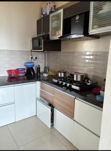Kitchen Image of 975 Sq.ft 2 BHK Apartment / Flat for sale in Amanora Adreno Towers, Hadapsar Pune for Rs. 13300000