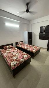 Bedroom Image of ROOMSOOM PG in Sector 135, Noida